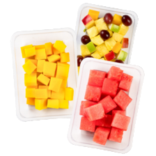 Ananas, mango of watermeloen blokjes of fruitsalade ananas/druif